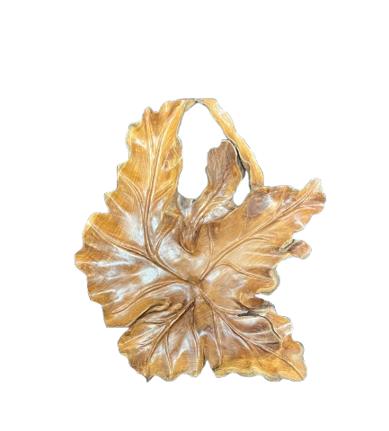 Hand-carved solid wood leaf wall sculpture featuring detailed tropical botanical veins and natural teak root grain, styled for organic modernism luxury interiors.